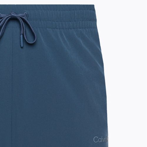Pánske tréningové šortky Calvin Klein 7" Woven DBZ crayon blue