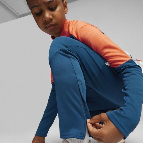 Detské futbalové nohavice PUMA Neymar JR Creativity Training ocean tropic/hot heat