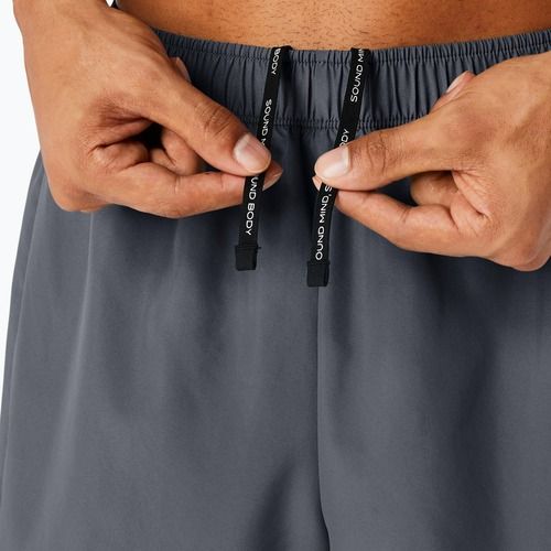 Pánske šortky na behanie ASICS Icon performance carrier grey / safety yellow