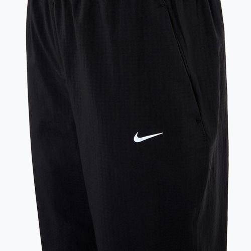 Dámske bežecké nohavice Nike Dri-Fit Fast Mid-Rise 7/8 black