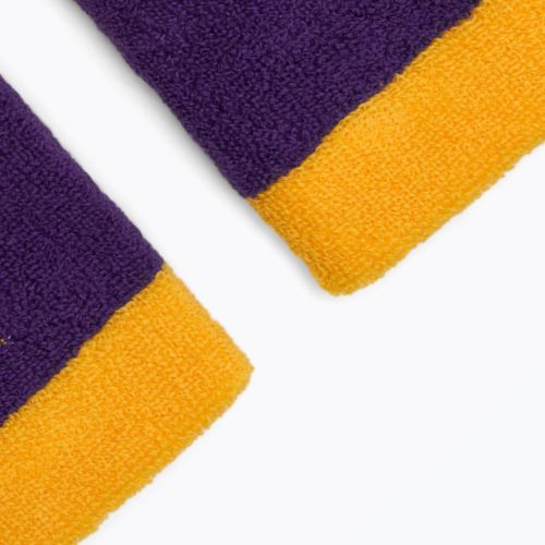 Potítka Nike Swoosh Doublewide Wristbands 2 szt. univerzity gold/court purple/university gold
