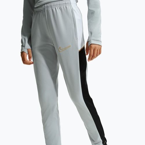 Detské nohavice Nike Academy Dri-Fit Jr light smoke grey/white/black/metallic gold