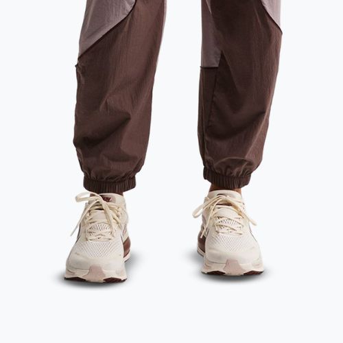 Dámske bežecké nohavice Nike Swift UV Repel Mid-Rise tattoo/light violet ore