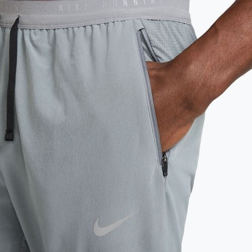 Pánske bežecké nohavice Nike Stride Dri-Fit Woven smoke grey
