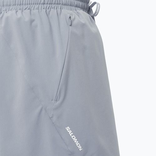 Pánske bežecké šortky Salomon SHAKEout Core 5" trade winds