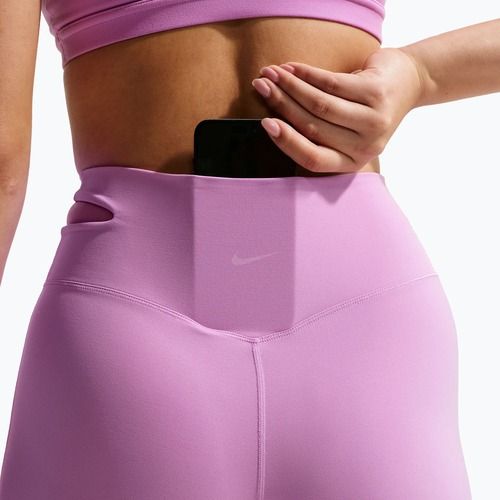 Dámske tréningové nohavice Nike Zenvy High-Waisted Flared light magenta/white