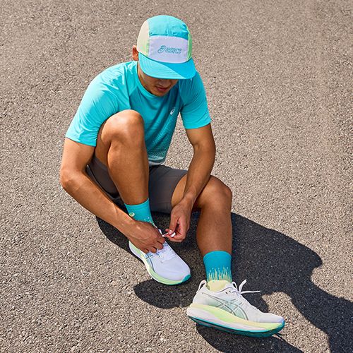 Pánske bežecké topánky ASICS Gel-Kayano 33 white/stadium orange