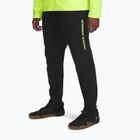 Pánske bežecké nohavice Under Armour Storm Run black / high vis yellow / reflective