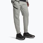 Pánske nohavice Under Armour Unstoppable Fleece mod gray/black