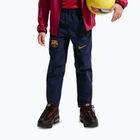 Detské futbalové nohavice Nike FC Barcelona Tech Woven blackened blue/black/mineral yellow