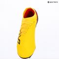 Futbalové kopačky New Balance Furon Team V8 FG punch yellow/black 100/fire cracker 9