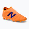 Detské kopačky New Balance Tekela V3+ Magique FG orange JST3FD35.M.045