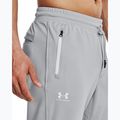 Pánske nohavice Under Armour Sportstyle Tricot Jogger mod šedá/biela 4