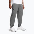 Pánske tréningové nohavice Under Armour Unstoppable Joggers castlerock/black