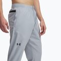 Pánske tréningové nohavice Under Armour Unstoppable Tapered harbor blue/black 4