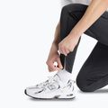 Pánske bežecké nohavice New Balance Sport Knit black 6