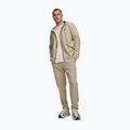 Pánske tréningové nohavice Under Armour Unstoppable Tapered Pants city khaki/black 2