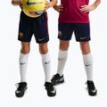 Detské futbalové šortky Nike FC Barcelona Strike blackened blue/noble red/mineral yellow