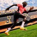Futbalové kopačky PUMA Ultra Ultimate FG/AG sunset glow/puma black/sun stream 14