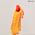Futbalové kopačky PUMA Ultra Ultimate FG/AG sunset glow/puma black/sun stream 19