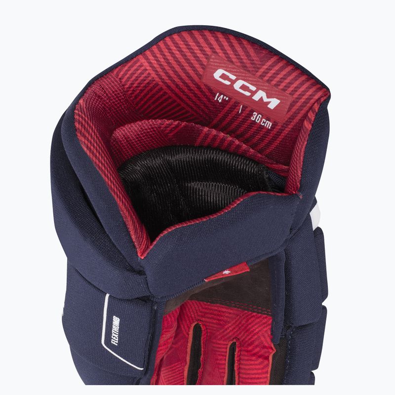 Detské hokejové rukavice CCM Next YTH navy/white 4