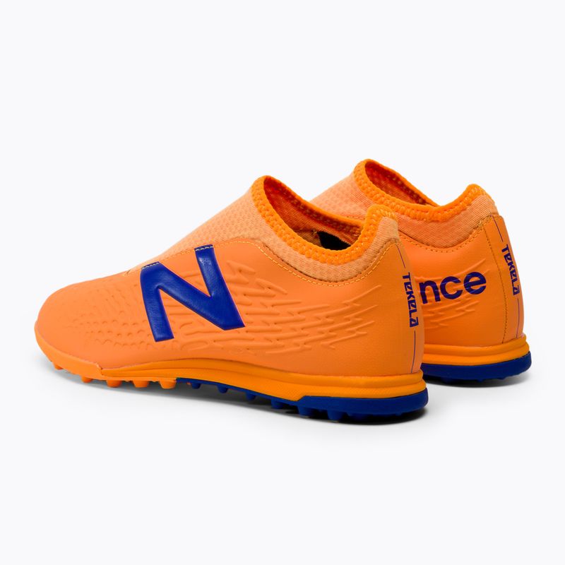 Detské kopačky New Balance Tekela V3+ Magique TF oranžové JST3TD35.M.055 3