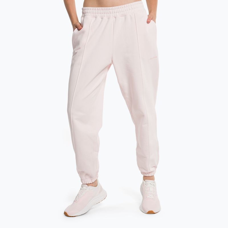 Dámske tréningové nohavice New Balance Athletics Nature State French Terry pink WP23553WAN
