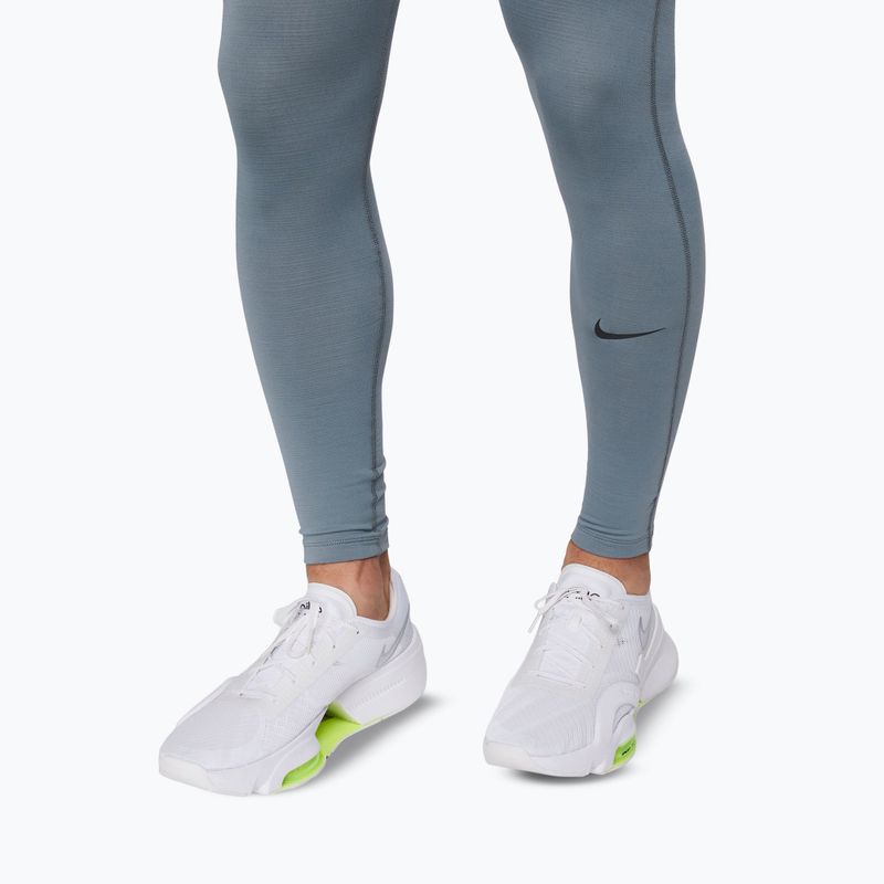 Pánske legíny Nike Pro Warm smoke grey/black 6