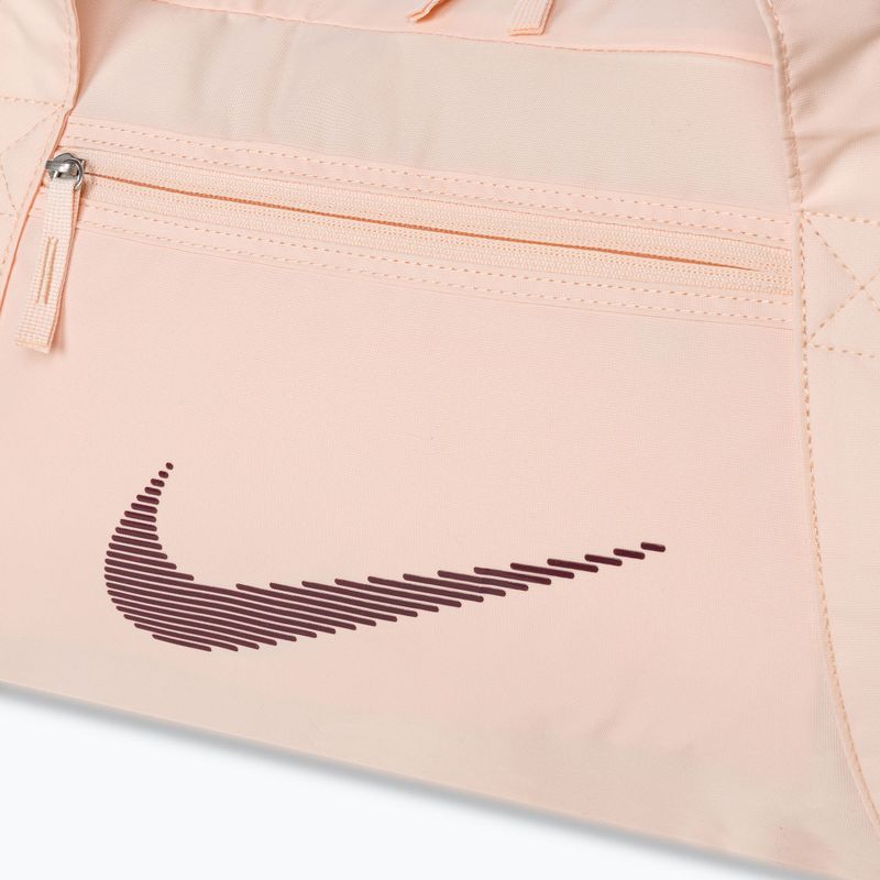 Tréningová taška Nike Gym Club 24 l guava ice/guava ice/night maroon 4