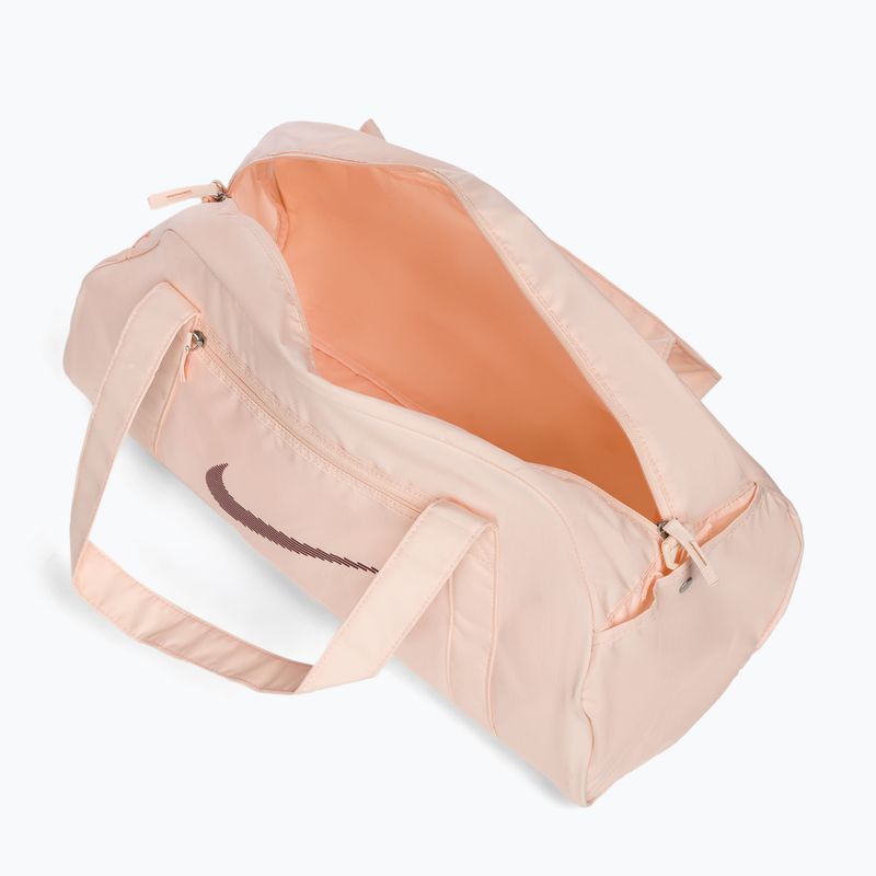 Tréningová taška Nike Gym Club 24 l guava ice/guava ice/night maroon 5