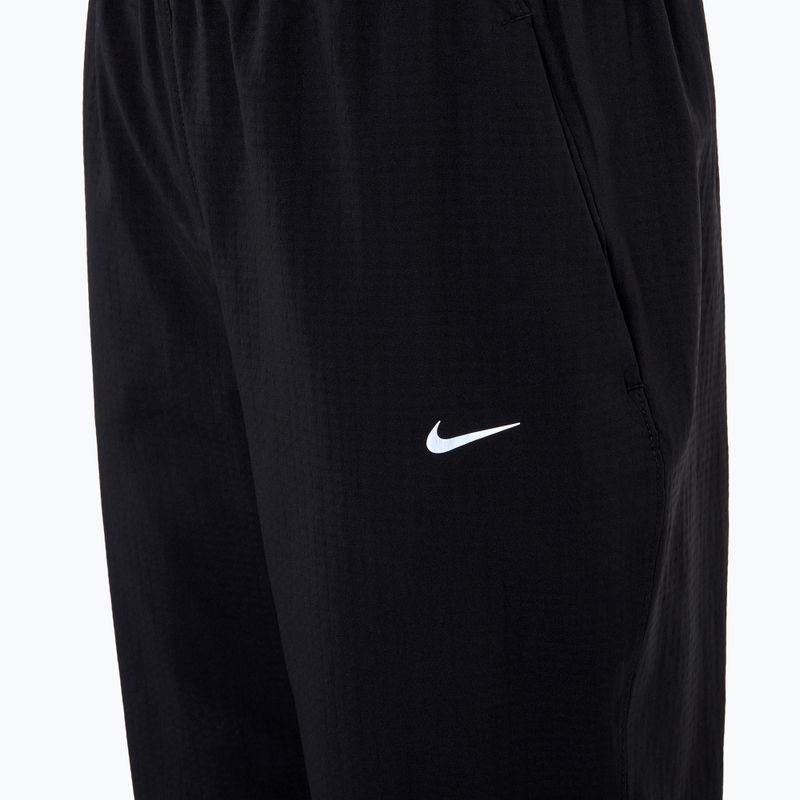 Dámske bežecké nohavice Nike Dri-Fit Fast Mid-Rise 7/8 black 3