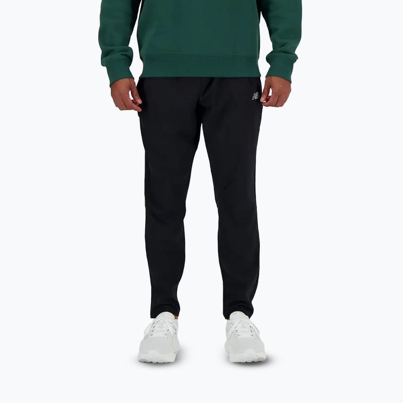 Pánske nohavice New Balance AC Tapered 29" black