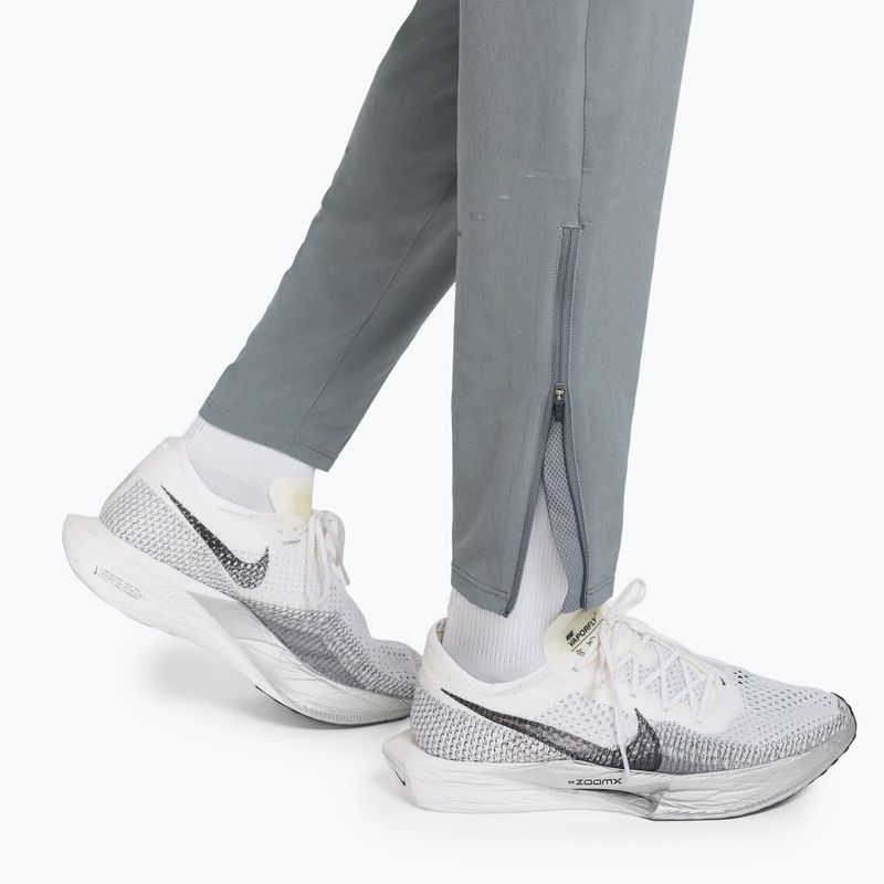 Pánske bežecké nohavice Nike Stride Dri-Fit Woven smoke grey 6