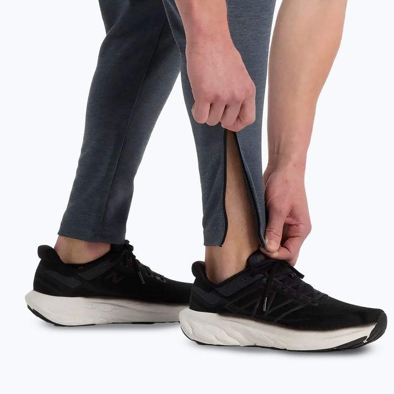 Pánske bežecké nohavice New Balance Sport Knit graphite 6