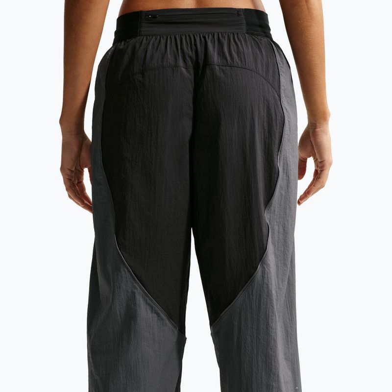 Dámske bežecké nohavice Nike Swift UV Repel Mid-Rise black/iron grey 6