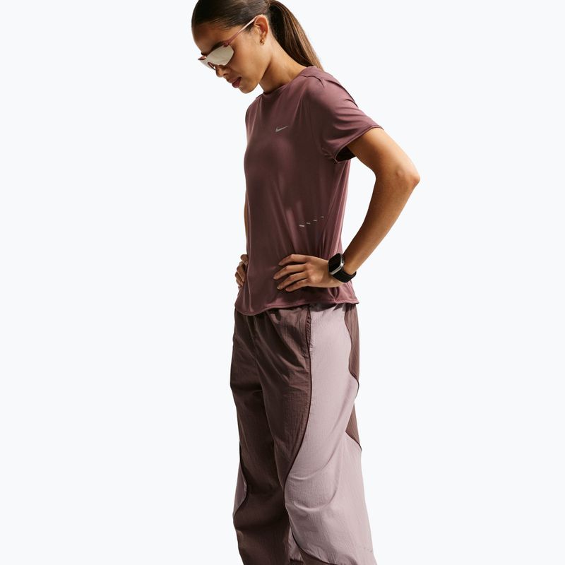 Dámske bežecké nohavice Nike Swift UV Repel Mid-Rise tattoo/light violet ore 6