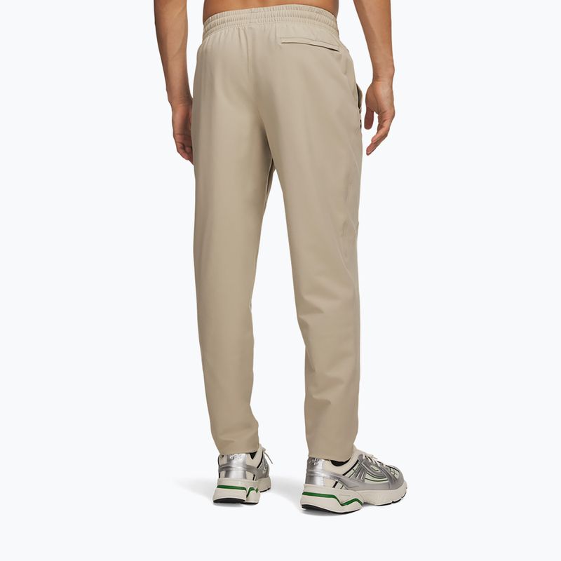 Pánske tréningové nohavice Under Armour Unstoppable Tapered Pants city khaki/black 3