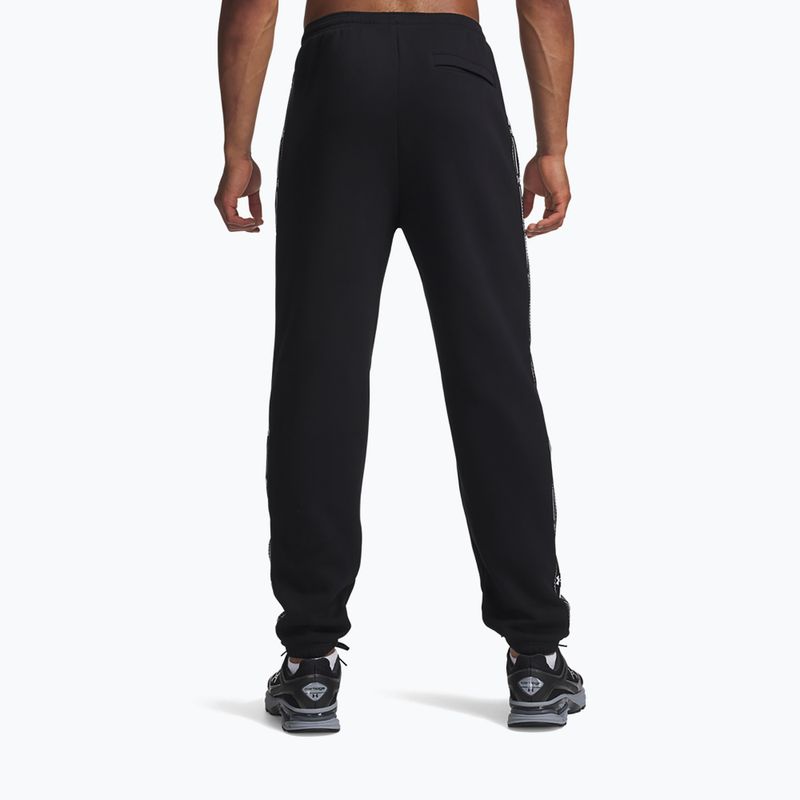 Pánske nohavice Under Armour Icon Fleece Taped Jogger ultimate black/white 3