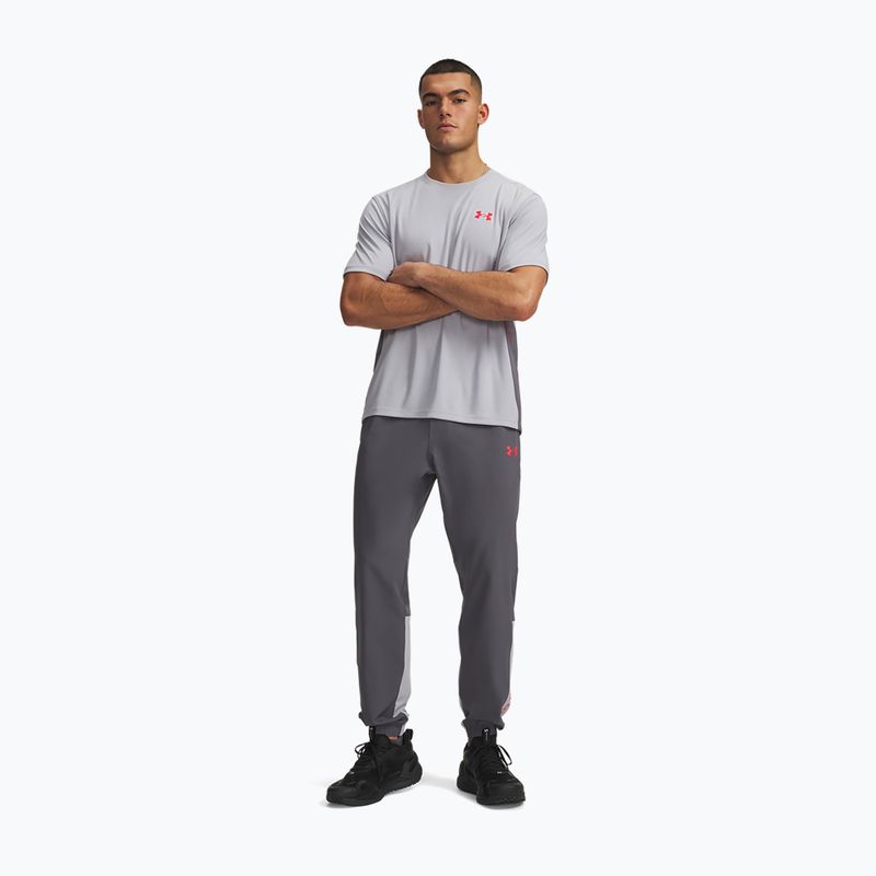 Pánske tréningové nohavice Under Armour Tech Utility Woven Pants castlerock/mod gray/racer red 2