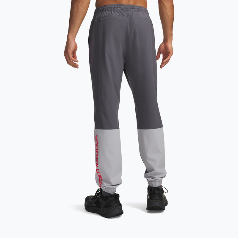 Pánske tréningové nohavice Under Armour Tech Utility Woven Pants castlerock/mod gray/racer red 3