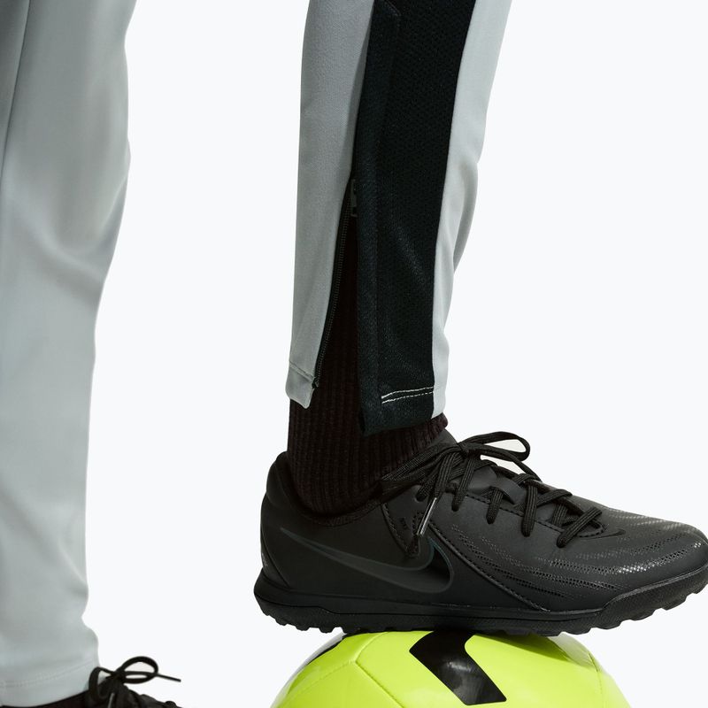 Detské nohavice Nike Academy Dri-Fit Jr light smoke grey/white/black/metallic gold 7