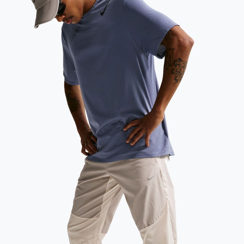 Pánske bežecké nohavice Nike Stride Repel Woven cream li/birch/natural 6