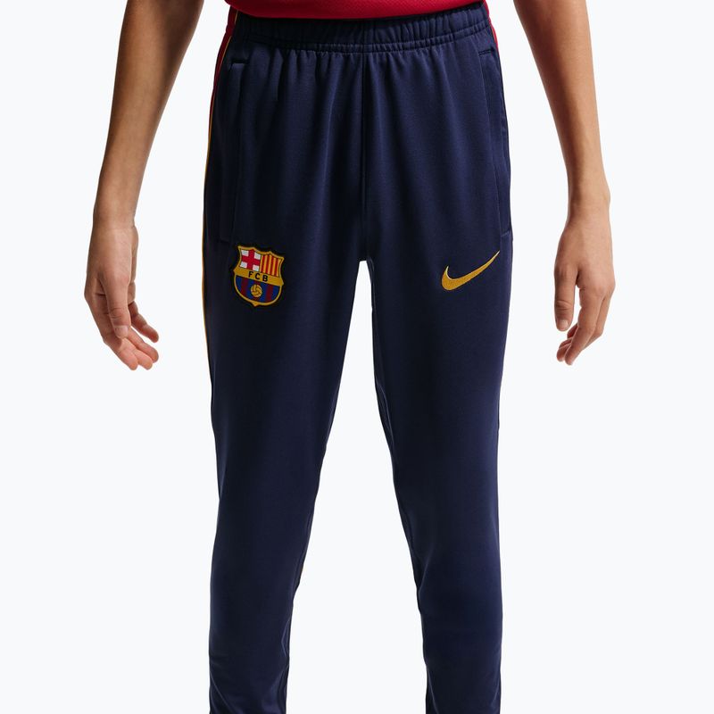 Detské futbalové nohavice Nike FC Barcelona Strike Dri-Fit blackened blue/noble red/yellow 7