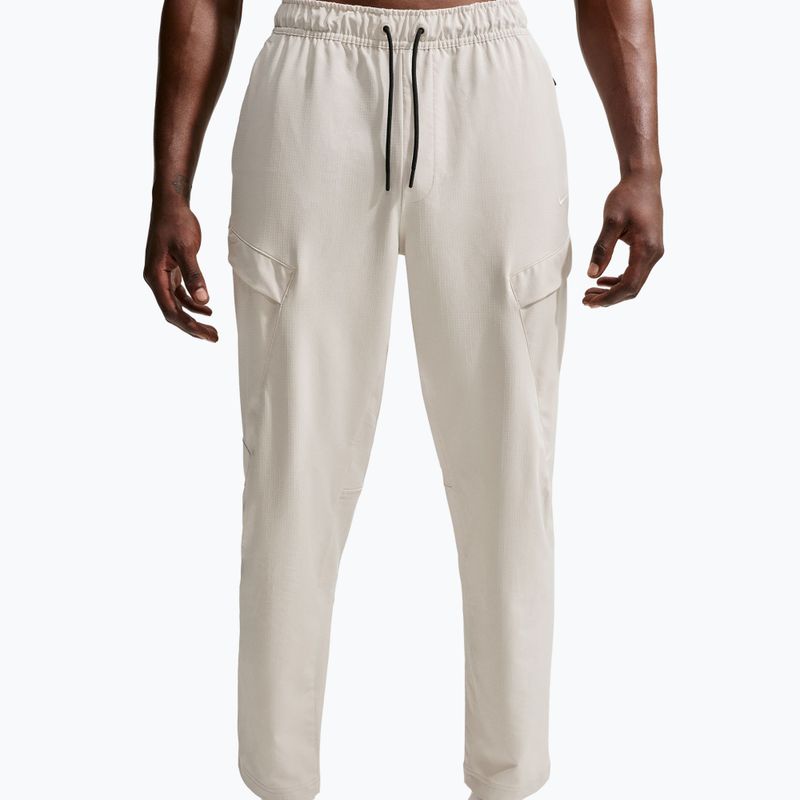 Pánske nohavice Nike Unlimited ight orewood brown/black/light orewood brown