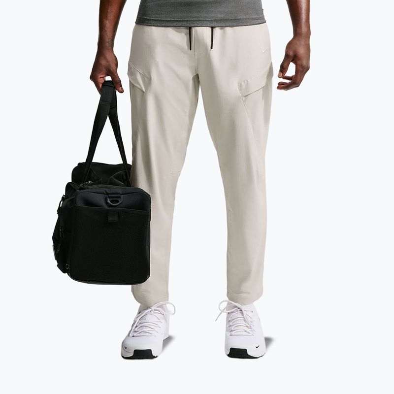 Pánske nohavice Nike Unlimited ight orewood brown/black/light orewood brown 7