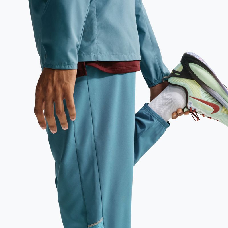 Pánske bežecké nohavice Nike Miler Dri-Fit Woven smokey blue/cerulean 6