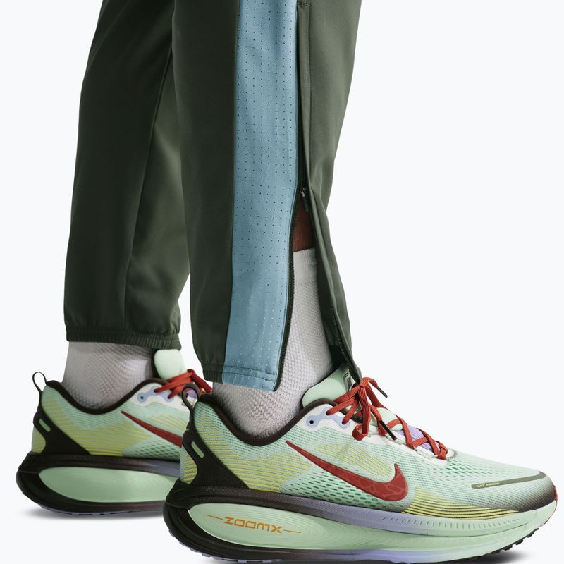 Pánske bežecké nohavice Nike Miler Dri-Fit Woven camo green/mineral slate 7