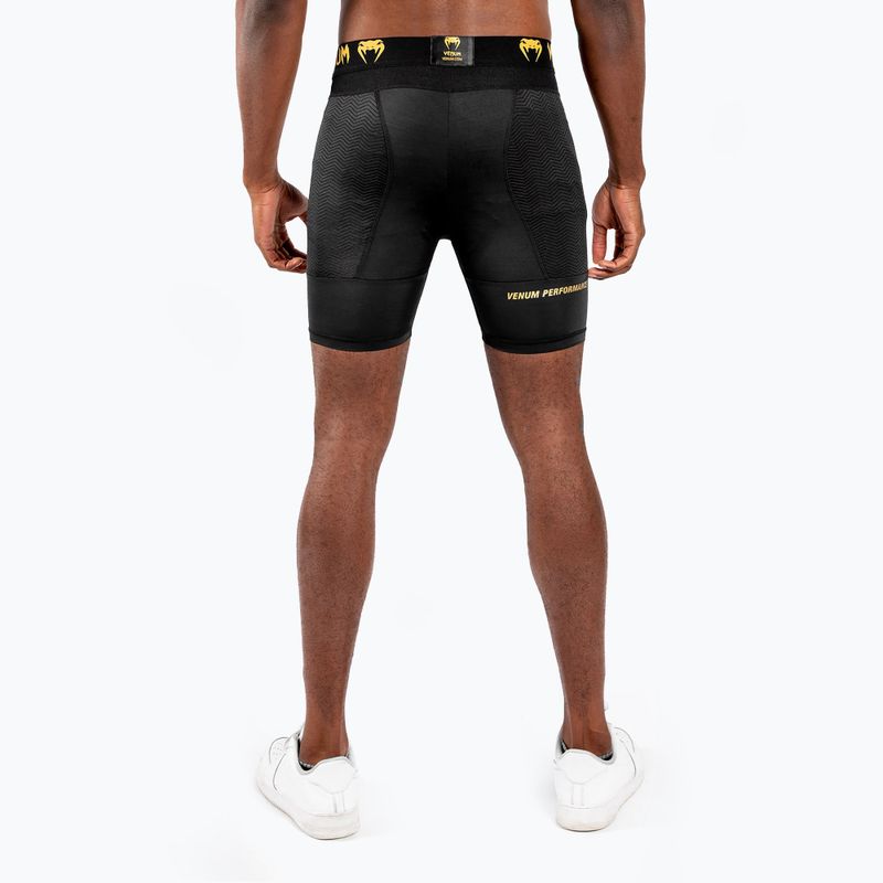 Pánske tréningové krátke nohavice  Venum G-Fit Compression black/gold 2