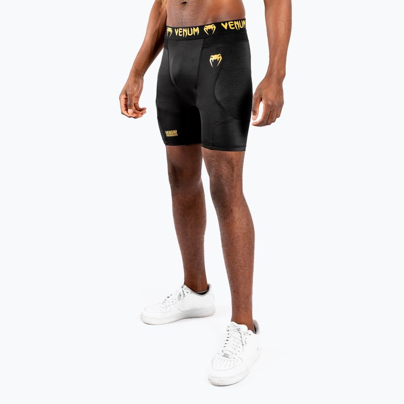 Pánske tréningové krátke nohavice  Venum G-Fit Compression black/gold 3