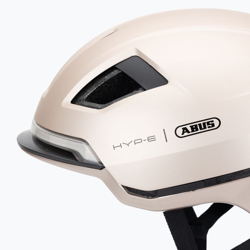 Cyklistická prilba s ukazovateľmi smeru ABUS Hyp-E champagne gold 7